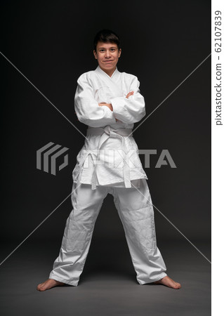 portrait of a teenager dressed in martial arts portrait of a teenager dressed in martial arts 62107839