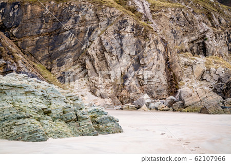 The beach and caves at Maghera Beach near Ardara, County Donegal - Ireland. The beach and caves at Maghera Beach near Ardara, County Donegal - Ireland. 62107966