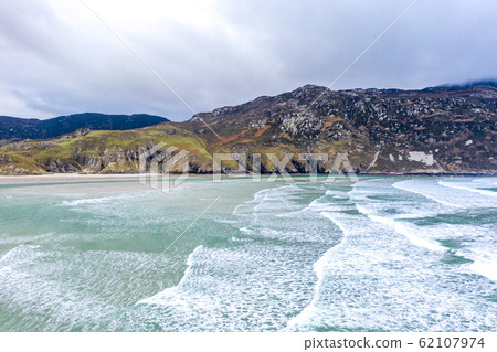 Aerial view of the beach and caves at Maghera Beach near Ardara, County Donegal - Ireland 62107974