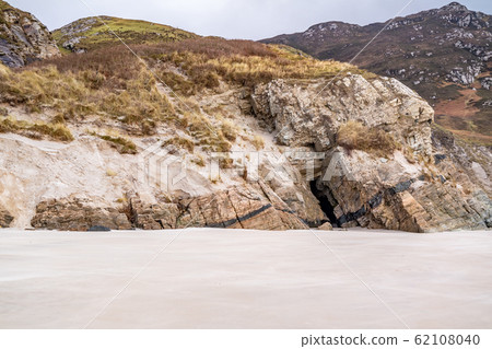 The caves and beach at Maghera Beach near Ardara, County Donegal - Ireland The caves and beach at Maghera Beach near Ardara, County Donegal - Ireland 62108040