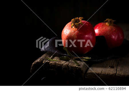 Two grenades on a table 62110894