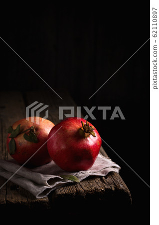Two grenades on the edge of a table 62110897