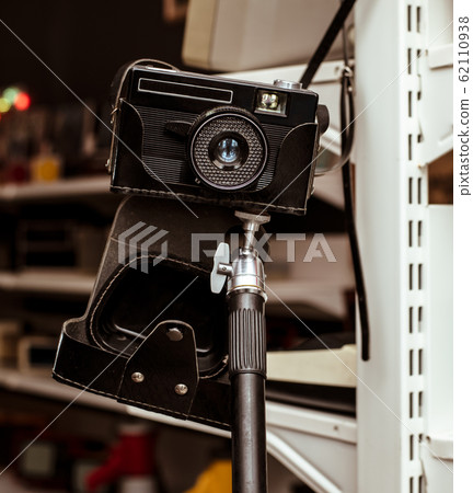 Vintage soviet film camera on a tripod Vintage soviet film camera on a tripod 62110938