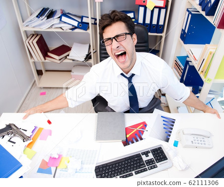 The angry and scary businessman in the office 62111306