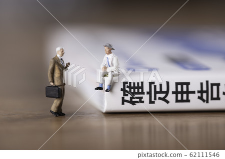 Businessman talking about tax return Businessman talking about tax return 62111546