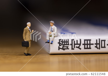 Businessman talking about tax return Businessman talking about tax return 62111548