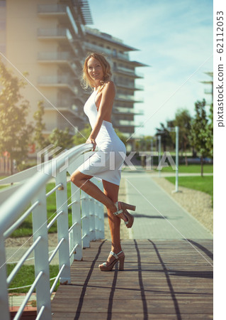 Beautiful young woman in a blonde in a sexy trendy Beautiful young woman in a blonde in a sexy trendy 62112053