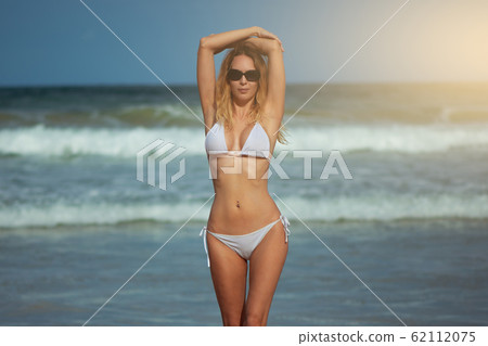 Young slim beautiful woman stay and posing in the Young slim beautiful woman stay and posing in the 62112075