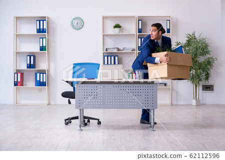 Young employee being made redundant 62112596