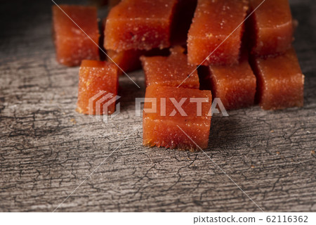 dices of quince cheese on a table dices of quince cheese on a table 62116362