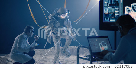 Scientist overseeing spacesuit test 62117093