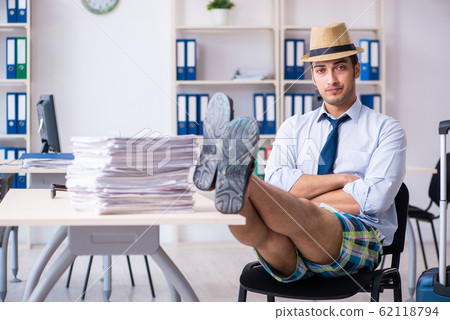 Young employee escaping for summer vacation 62118794