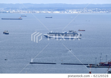 Yokohama cityscape in Japan: Quarantine work of a cruise ship carrying a new coronavirus-infected person continues off the coast of Yokohama Port on April 4 62120328