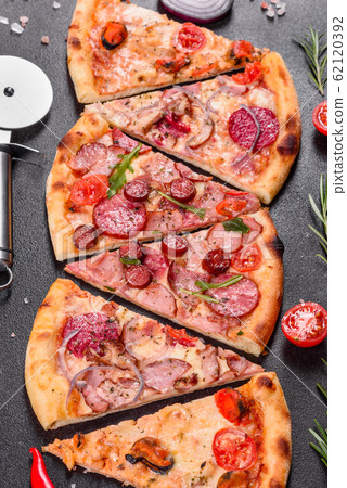 Pepperoni Pizza with Mozzarella cheese, salami Pepperoni Pizza with Mozzarella cheese, salami 62120392