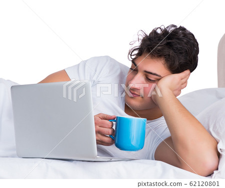 Man in bed suffering from insomnia 62120801