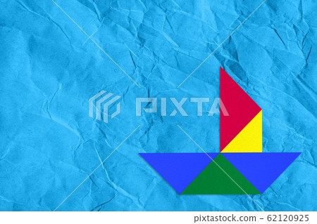 Color paper cutout applique origami boat on blue Color paper cutout applique origami boat on blue 62120925