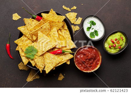 Mexican nachos chips and sauces 62121423