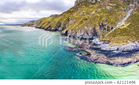 Aerial view of the beach and caves at Maghera Beach near Ardara, County Donegal - Ireland Aerial view of the beach and caves at Maghera Beach near Ardara, County Donegal - Ireland 62121496
