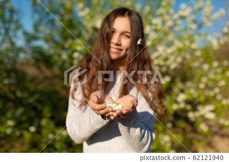 Portrait of a young beautiful teenager girl in a 62121940
