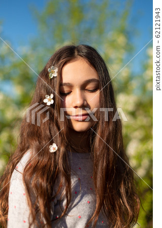 Portrait of a young beautiful teenager girl in a 62121943
