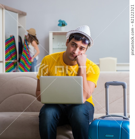 Young family preparing for travel vacation 62122321