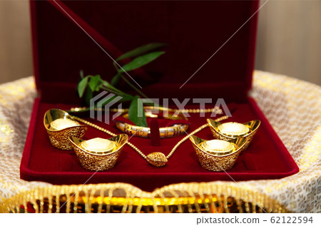 Gold Bars, Gold Lace and Necklace used as wedding dowry in Traditional Chinese marriage ceremony 62122594
