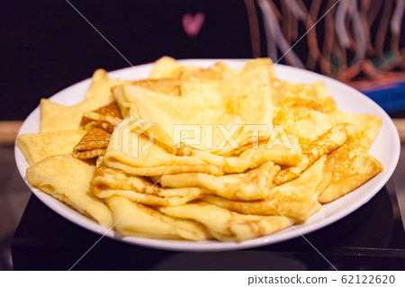 Fresh fluffy homemade pancakes as an everyday convenience food 62122620