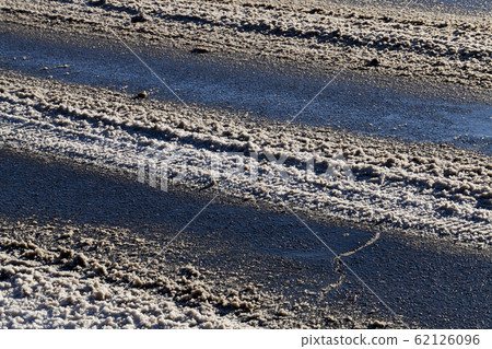 Asphalt road in winter Asphalt road in winter 62126096