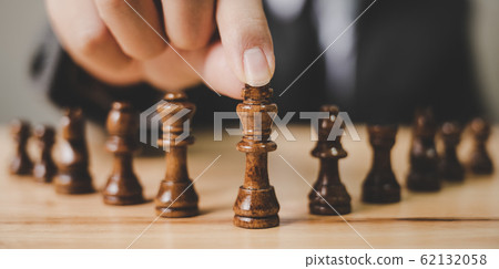 Panoramic image. Businessman with chess board game. Plan strategy and tactic concept 62132058