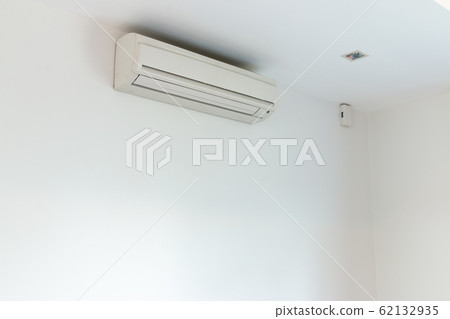 Air conditioning Installed on a white concrete Air conditioning Installed on a white concrete 62132935