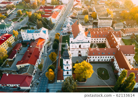 Pinsk, Brest Region, Belarus. Pinsk Cityscape Skyline In Autumn Morning. Bird's-eye View Of Cathedral Of Name Of The Blessed Virgin Mary And Monastery Of The Greyfriars. Famous Historic Landmarks Pinsk, Brest Region, Belarus. Pinsk Cityscape Skyline In Autumn Morning. Bird's-eye View Of Cathedral Of Name Of The Blessed Virgin Mary And Monastery Of The Greyfriars. Famous Historic Landmarks 62133614