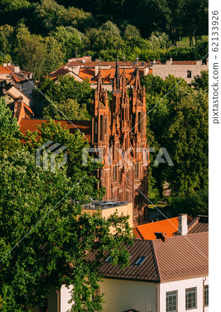 Vilnius, Lithuania. View Of Roman Catholic Church Of St. Anne In Old Town In Summer Day. Unesco World Heritage Vilnius, Lithuania. View Of Roman Catholic Church Of St. Anne In Old Town In Summer Day. Unesco World Heritage 62133926