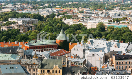 Riga, Latvia. Cityscape In Sunny Summer Day. Famous Landmark - Powder Tower. Riga, Latvia. Cityscape In Sunny Summer Day. Famous Landmark - Powder Tower. 62133947