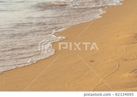 Tiny crab on the sand at peaceful beach Tiny crab on the sand at peaceful beach 62134095