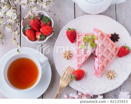 Tea time with strawberry waffle cake 62135915