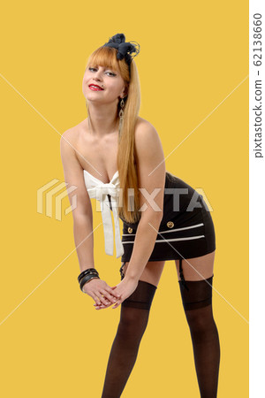 sexy pin up girl in black dress isolated on the sexy pin up girl in black dress isolated on the 62138660
