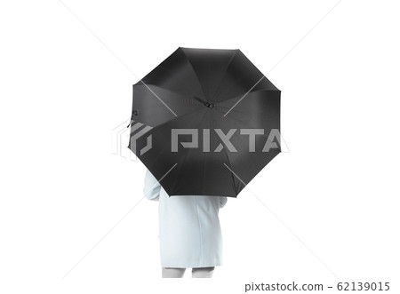 Women stand backwards with black blank umbrella opened mockup 62139015