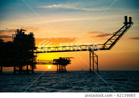 Offshore construction platform for production oil and gas. Oil and gas industry and hard work. Production platform and operation process by manual and auto function from control room. 62139865