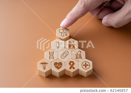 Medical icon on hexagon jigsaw for global health Medical icon on hexagon jigsaw for global health 62140857