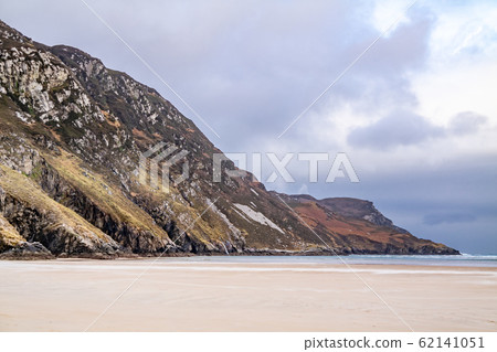 The beach and caves at Maghera Beach near Ardara, County Donegal - Ireland. The beach and caves at Maghera Beach near Ardara, County Donegal - Ireland. 62141051