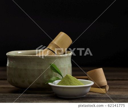 Organic Green Matcha Tea in a Bowl 62141775