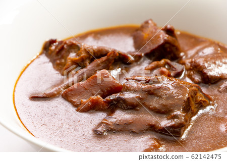 Up of beef tongue stew. Up of beef tongue stew. 62142475