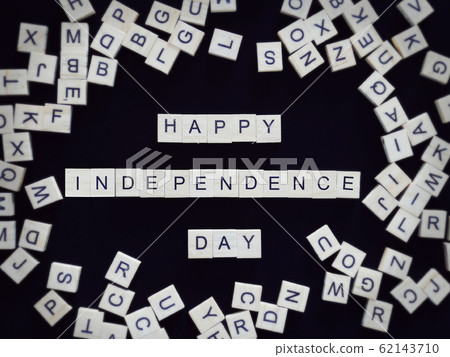 Happy Independence Day greeting card, alphabet letters word happy independence day on wooden pieces, isolated on black for background Happy Independence Day greeting card, alphabet letters word happy independence day on wooden pieces, isolated on black for background 62143710