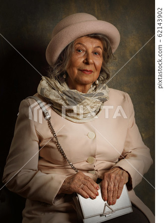 Portrait of an old lady in a hat, scarf and Portrait of an old lady in a hat, scarf and 62143902