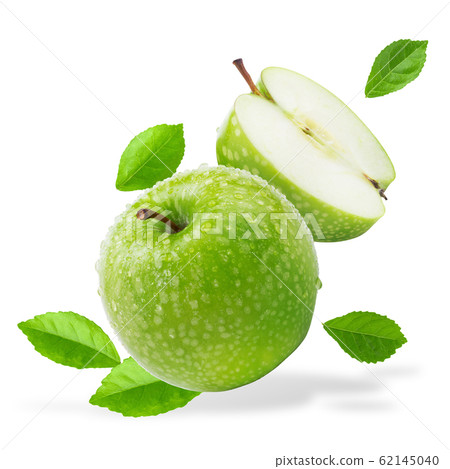 Water splashing on Fresh green apple on Green 62145040