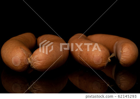 German pork sausage isolated on black glass 62145293