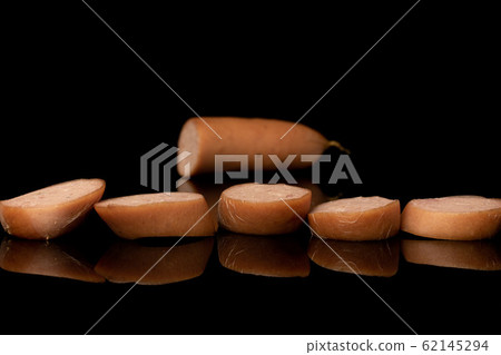 German pork sausage isolated on black glass German pork sausage isolated on black glass 62145294
