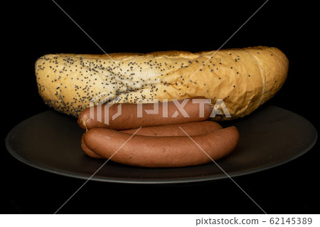 German pork sausage isolated on black glass 62145389