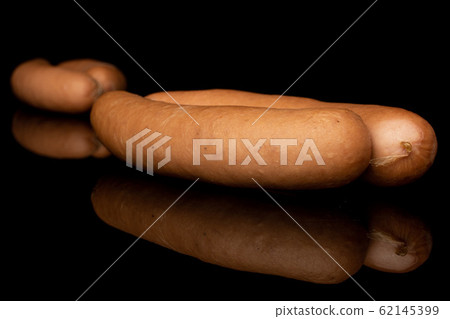 German pork sausage isolated on black glass German pork sausage isolated on black glass 62145399