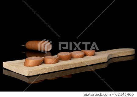 German pork sausage isolated on black glass German pork sausage isolated on black glass 62145400
